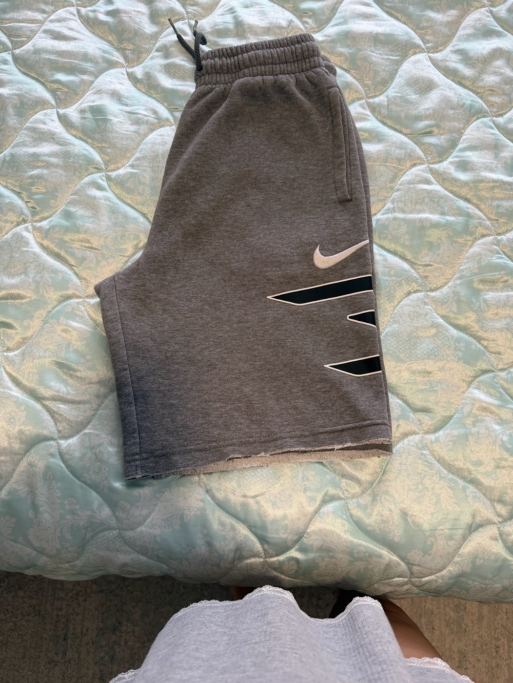 Nike Gray Boys' Athletic Shorts with White Swoosh and Black Accents